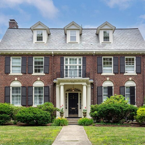 Brick Georgian Colonial with dormers and black shutters, Northeast Florida neighborhoods