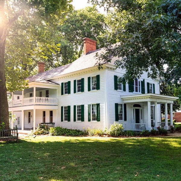 White antebellum-style estate home with two-story porch and green shutters, Northeast Florida White antebellum-style estate home with two-story porch and green shutters, Northeast Florida