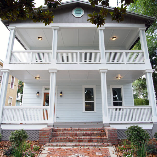 01-classic-colonial-front-porch-exterior-springfield Two story colonial home in Historic Springfield with stacked front porches and brick entry steps