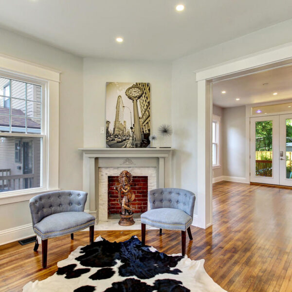 012-modern-living-room-historic-springfield Modernized living room interior showing high ceilings and architectural trim in Historic Springfield.