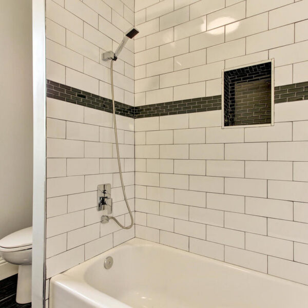 025-tile-guest-bath-springfield-renovation Custom tile shower installation inside a renovated guest bathroom in Historic Springfield.