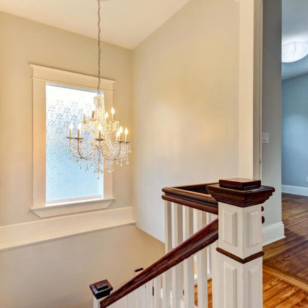 028-upstairs-foyer-historic-renovation-fl Second floor upstairs foyer landing with custom built-ins in a 1914 historic home.