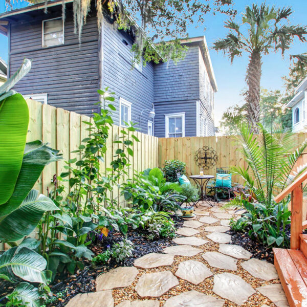 045-fenced-backyard-springfield-home-renovation Fully fenced urban backyard and lawn landscaping following a historic home renovation.