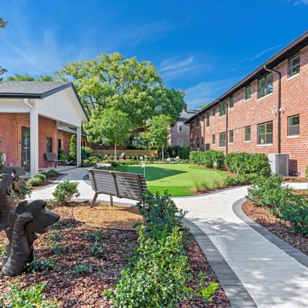 045-outdoor-resident-lounge-renovation Relaxing community courtyard seating area designed during a full historic building restoration.