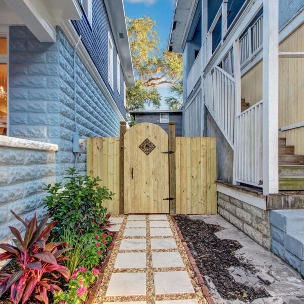 046-backyard-entrance-jacksonville-urban-core Rear exterior entrance view of a 1914 historic property remodel in Jacksonville's Urban Core.