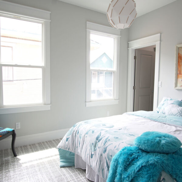 13-classic-colonial-bedroom-tall-windows-daylight Bedroom washed in daylight from two tall double hung windows with crisp painted trim